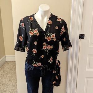 Lush black wrap top with pink and green floral print size S